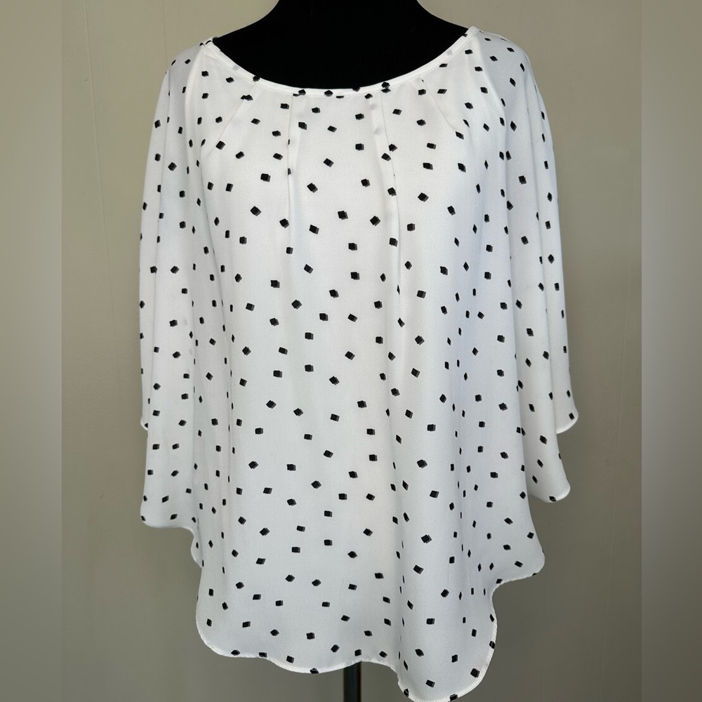 ELLE white with black squares shirt, size medium.